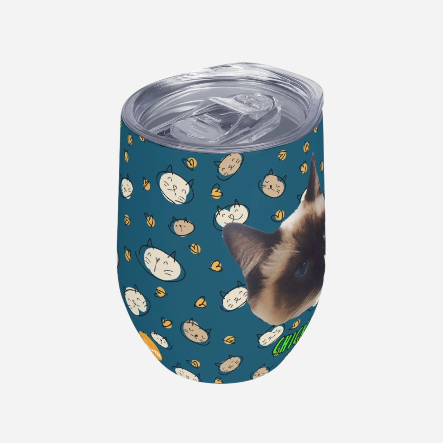 Tumbler with cat pattern and a real cat's face on a blue background