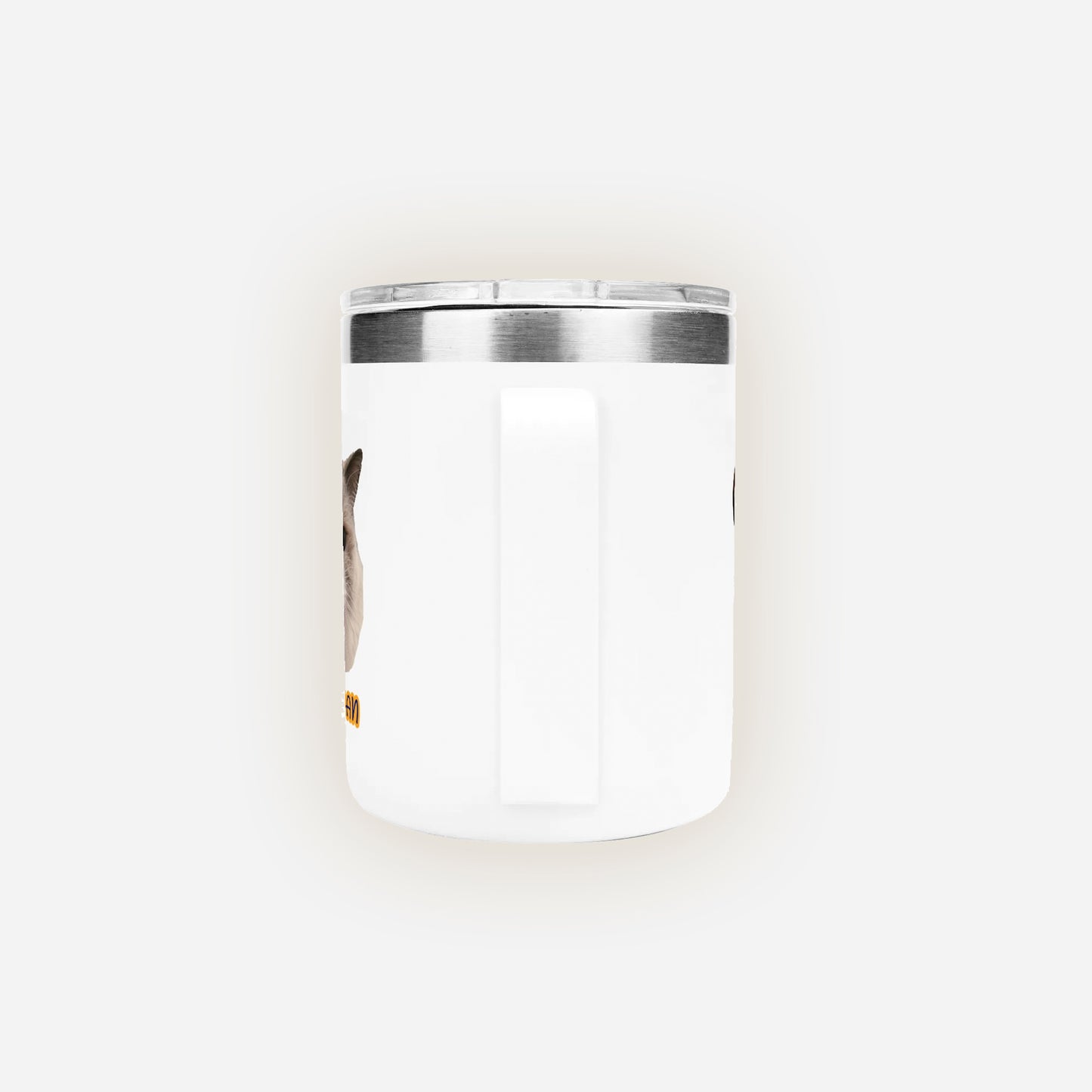 White candle in a glass container with a silver lid on a white background