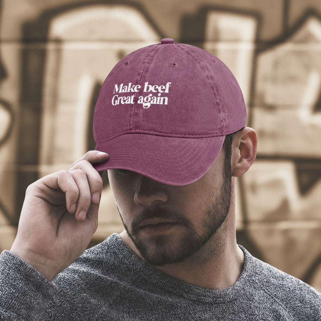 Person wearing a maroon cap with 'Make beef Great again' text on a white background
